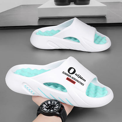 Discover the New Men's Massage Slippers, perfect for both indoor and outdoor use. These casual beach sandals feature a comfortable sole and come in a wide range of sizes from 38 to 47. - 02ALABA